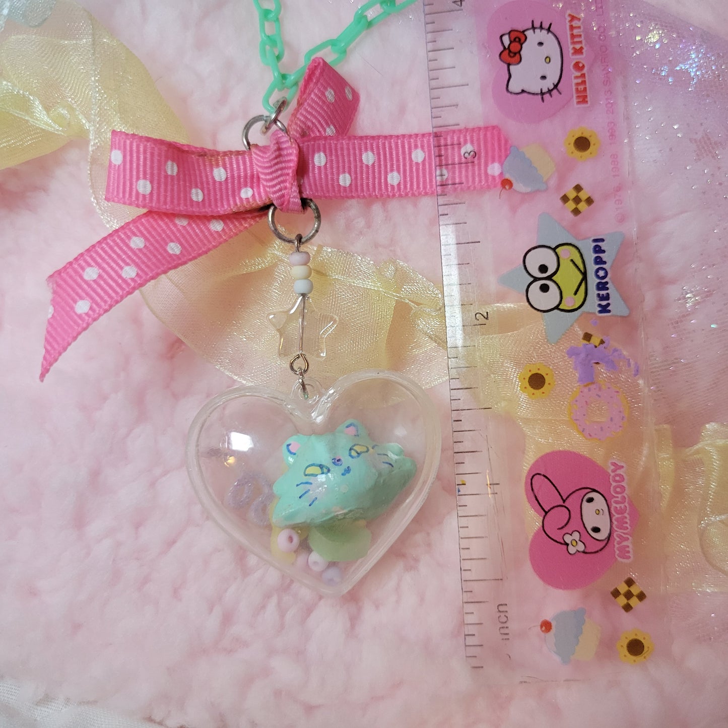 kitty capsule necklace